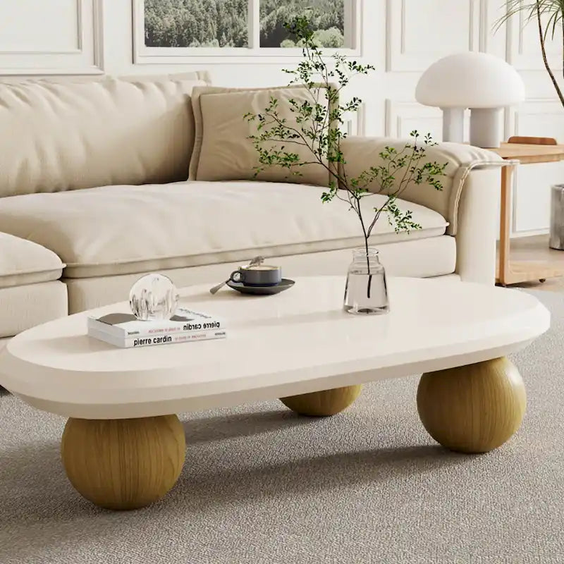 Round Wood Coffee Table with Three Decorative Ball Legs Cream Black Brown